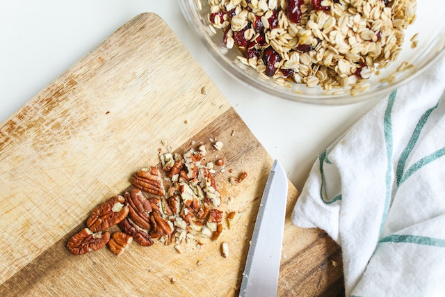 Photo by Polina Tankilevitch: https://www.pexels.com/photo/photo-of-chopped-pecans-on-wooden-chopping-board-3872415/